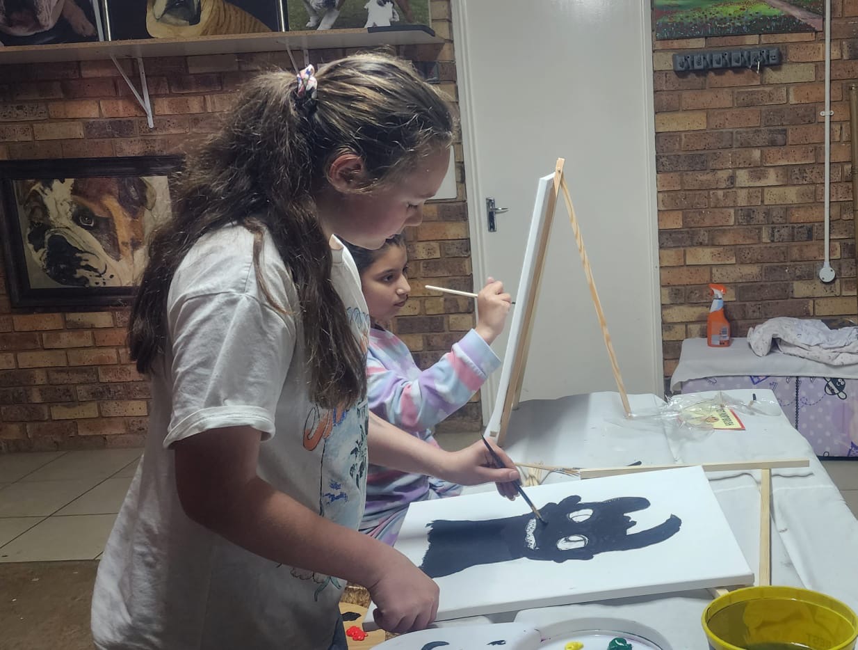 Kids creating colorful art projects