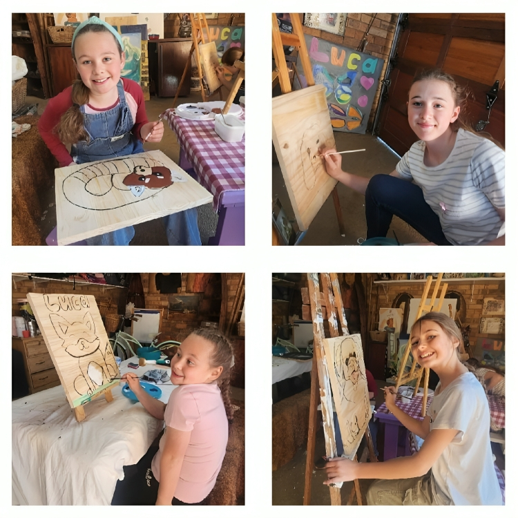 Kids creating colorful art projects in a bright, welcoming art studio